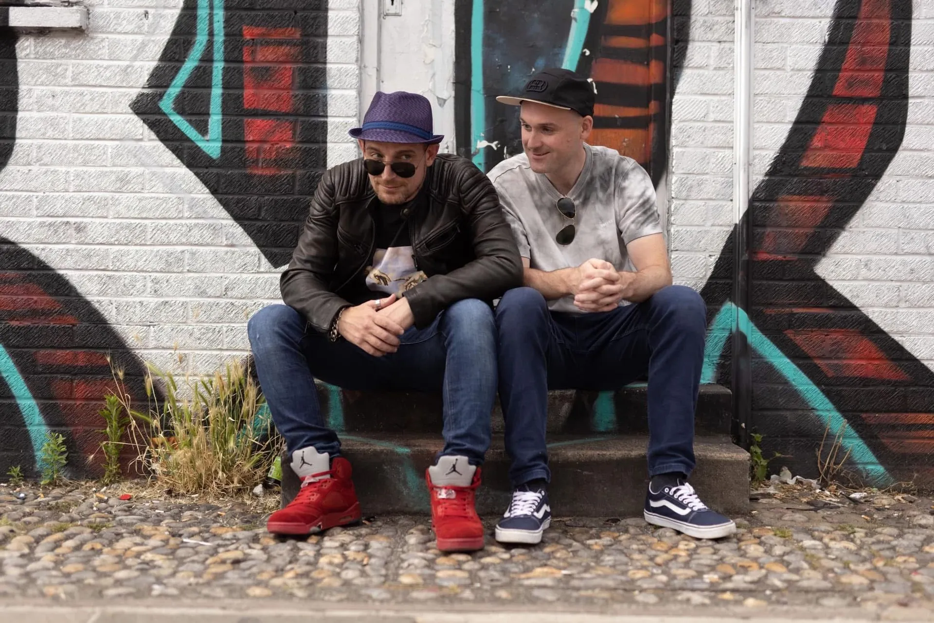 Carl Nicholson and Paul Skelton sitting together outside